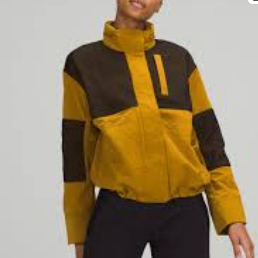 Lululemon women’s water repellent mesh rain jacket.